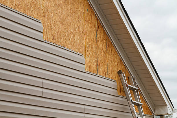 Professional Siding Replacement technician working in North Canton, OH